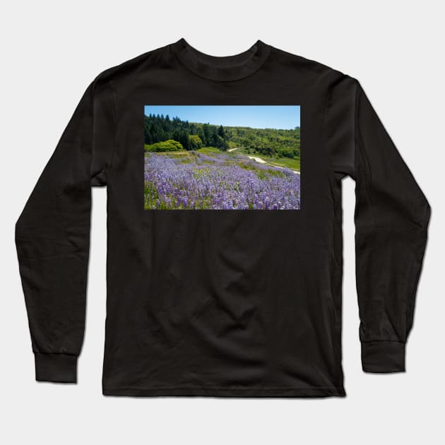 Lupine flowers on a hillside Long Sleeve T-Shirt by blossomcophoto